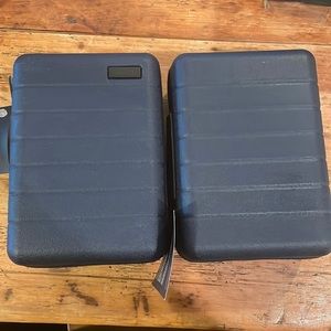 Two United x Away toiletry bags